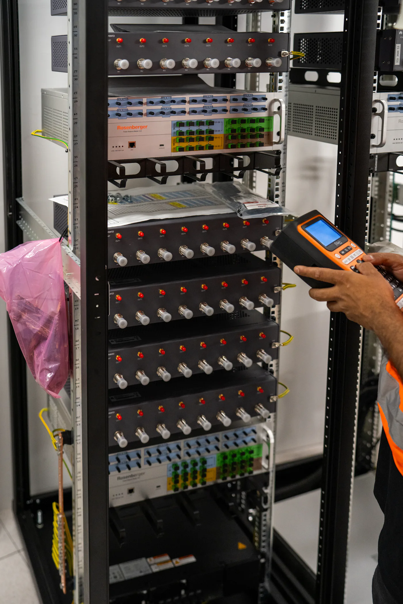 SYC engineer testing a network rack